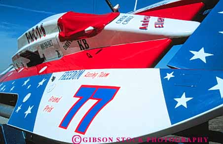 Stock Photo #10828: keywords -  aerodynamic boat boats colorful design detroit fiberglass horz hydrodynamic hydroplane hydroplanes lightweight material michigan modern new race racer racers races racing river sleek style summer synthetic water