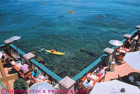 Stock Photo #10864: keywords - attraction boat boats cafe cafes california cannery coast coastal destination dine dining duck horz kayak kayaker kayakers kayaking kayaks monterey ocean outdoor outside paddle passing patio recreation resort resorts restaurant row sea seashore shore shoreline sport summer tourist travel travelers water