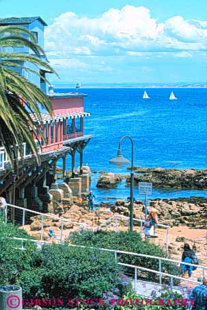 Stock Photo #10866: keywords - and attraction beach california cannery coast coastal destination monterey ocean people resort resorts row sea seashore shops shore shoreline summer tourist travel travelers vert water
