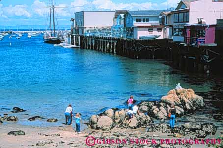 Stock Photo #10870: keywords - attraction beach california coast coastal destination dock docks fishermens fun horz monterey near ocean people play playing sea seashore shore shoreline summer tourist travel travelers water wharf wharfs