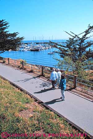 Stock Photo #10879: keywords -  along boat boats california exercise harbor harbors marina marinas monterey moor moored people port recreation vert walk walker walking