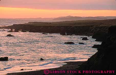 Stock Photo #10911: keywords -  big california coast coastal dusk evening horz landscape landscapes monterey mood moody nature near ocean orange reflect reflection reflects scenery scenic sea seascape seashore shore shoreline sunset sunsets sur surf water