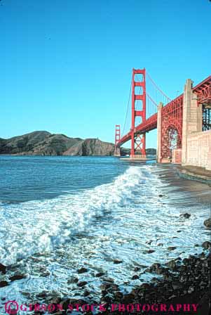 Stock Photo #10490: keywords -  bay beach beaches bridge bridges cable california coastal engineer engineered engineering famous francisco gate golden landmark landmarks marin metal ocean red san seacoast seashore shoreline span spans steel surf suspension tall tower towers vert water wave waves