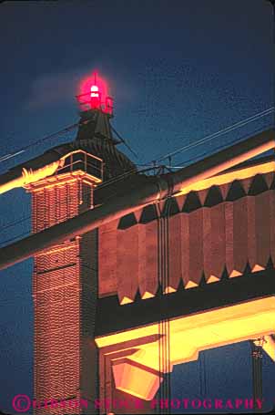 Stock Photo #10501: keywords -  bay bridge bridges cable california dark detail engineer engineered engineering famous francisco gate golden landmark landmarks lighting lights metal night red san span spans steel suspension tall tower towers vert water
