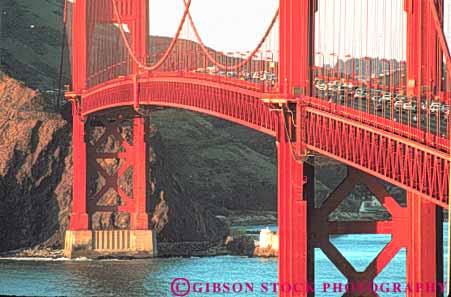 Stock Photo #10504: keywords -  arch arches bay brace bracing bridge bridges cable california curve deck engineer engineered engineering famous francisco gate geometric geometrical geometry golden horz landmark landmarks metal red san span spans steel suspension tall tower towers water