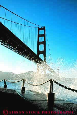 Stock Photo #10514: keywords - bay bridge bridges cable california engineer engineered engineering famous francisco gate golden landmark landmarks metal red san span spans splash spray steel surf suspension tall tower towers vert water