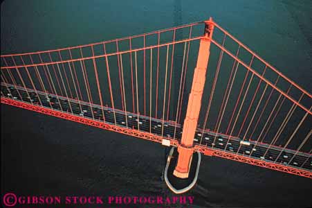 Stock Photo #10518: keywords -  aerial aerials bay bridge bridges cable california engineer engineered engineering famous francisco gate geometric geometrical geometry golden horz landmark landmarks metal red san south span spans steel suspension tall tower towers water