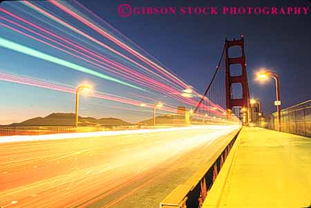 Stock Photo #10523: keywords - abstract abstraction abstracts blur blurred bridge bridges bright california dark dusk evening famous francisco gate golden headlight horz landmark landmarks lights linear metal movement moving night san span spans steel streaks suspension taillight tall tower towers traffic