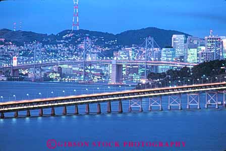 Stock Photo #10576: keywords - bay blur blurred blurs bridge bridges bright california cities city cityscape cityscapes connect connected connects dark dusk engineer engineered engineering evening francisco headlight highway highways horz landmark landmarks light lighting lights metal night orange road roads san skyline skylines span spans steel streak streaks street streets sunset sunsets support supports tail tall tower towers traffic urban warm