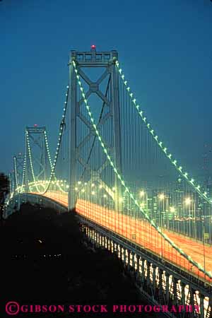 Stock Photo #10578: keywords -  bay blur blurred bridge bridges bright california connect connected connects dark dawn dusk engineer engineered engineering evening francisco highway highways landmark landmarks light lighting lights metal morning pattern road roads san span spans steel streak streaks street streets support supports suspend suspended suspension tail tall tower towers traffic vert