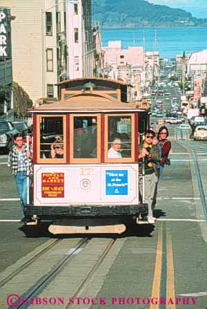 Stock Photo #10590: keywords - attraction cable california car cars cities city francisco landmark landmarks municipal passenger passengers powell public ride riders riding san street tourist transport transportation transporting vert