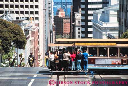 Stock Photo #10594: keywords -  attraction cable california car cars cities city crossing downtown francisco hills horz landmark landmarks municipal passenger passengers powell public ride riders riding san street tourist tourists transport transportation transporting