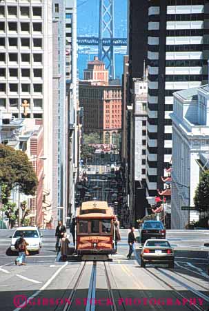 Stock Photo #10595: keywords -  attraction cable california car cars cities city downtown francisco hills landmark landmarks moving municipal passenger passengers public ride riders riding san street tourist transport transportation transporting up uphill vert