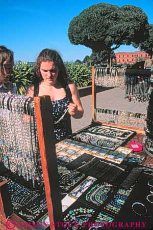 Stock Photo #10612: keywords -  art artist attraction business buy buyer buys california customer fishermans francisco necklace retail san sell seller selling small street summer tourist vendor vendors vert wharf woman