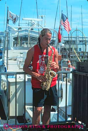 Stock Photo #10614: keywords - art artist attraction business california fishermans francisco man music musician player retail san saxophone sell seller selling small street tourist vendor vendors vert wharf
