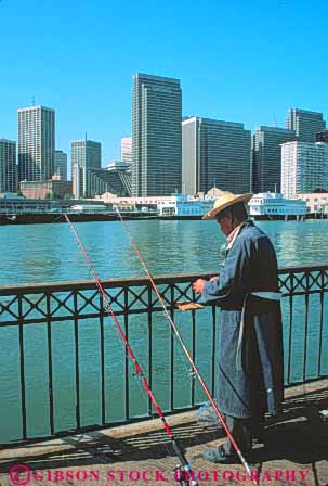 Stock Photo #10616: keywords - asian bay buildings california chinese cities city dock docks downtown ethnic fish fisherman fishermen fishing francisco man men pier piers recreation san skyline skylines sport summer vert waterfront
