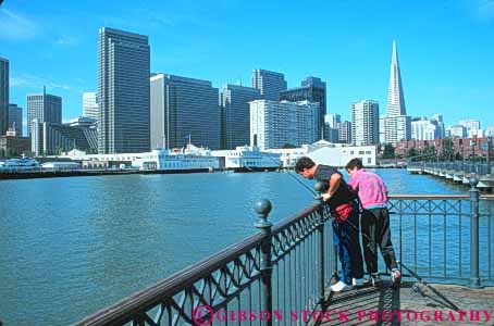 Stock Photo #10617: keywords -  bay boy california cities city cityscape cityscapes dad dock docks father fish fisherman fishermen fishing francisco horz pair pier piers san skyline skylines son summer waterfront
