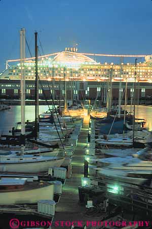 Stock Photo #13696: keywords - bay boating boats bright california cruise dark dock docks dusk evening francisco light lighting marina marinas pier sailboats san ship ships vert water waterfront waterfronts wharf wharfs