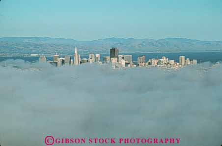Stock Photo #10643: keywords -  around buildings california cities city cityscape cityscapes climate cloud clouds condense condensed condenses condensing fog foggy francisco goes horz moisture ocean san skyline skylines urban vapor water weather