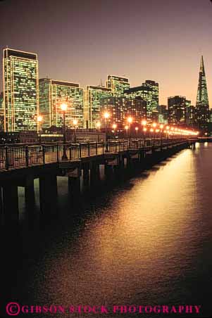 Stock Photo #7846: keywords - america american architecture building buildings business california center cities city cityscape cityscapes dark dock docks downtown dusk evening francisco lighting lights modern new night office offices pier piers reflect reflecting reflection reflects san skyline skylines sunset urban us usa vert wharf wharfs