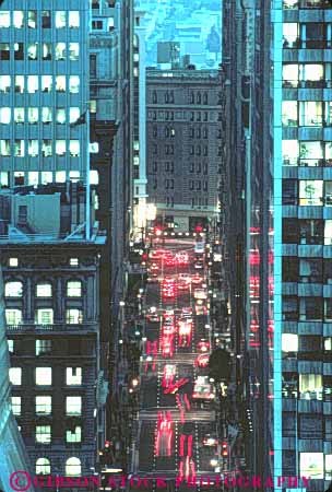 Stock Photo #10650: keywords -  architecture between blur blurred building buildings california center dark design district downtown dusk evening francisco high lighting lights modern motion move movement moving office offices rise san streak streaks street style tail traffic urban vert window windows