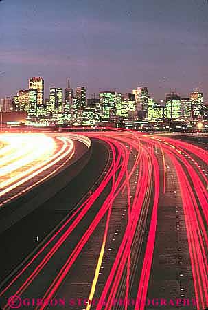 Stock Photo #10652: keywords -  blur blurred bright building california center cityscape cityscapes dark dusk evening francisco highway highways i interstate lighting lights motion move movement moving road roads san skyline skylines streak streaked streaks tail traffic transportation urban vert
