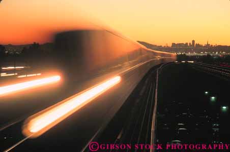 Stock Photo #10654: keywords - abstract action bart blur blurred california commute commuter commutes commuting dark dusk evening francisco horz in light lightrail lights motion move movement moving near oakland public rail railroad railroads san streak streaks sunset tail train trains transit transportation urban