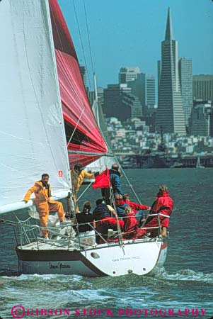 Stock Photo #10656: keywords -  aerodynamic aerodynamics air bay boating california crew driven effect effects float floating floats francisco glide glides gliding hull hulls people push pushing recreation sail sailboat sailboats sailing san sport sports team vert water wind