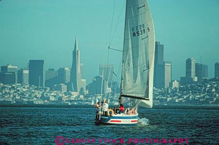 Stock Photo #10657: keywords -  aerodynamic aerodynamics air bay boating california crew driven effect effects float floating floats francisco glide glides gliding horz hull hulls people push pushing recreation sail sailboat sailboats sailing san sport sports team water wind