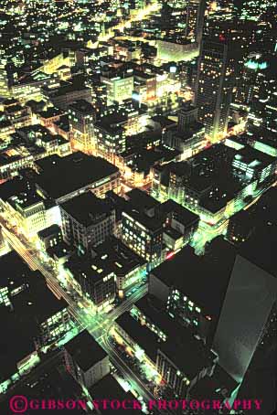 Stock Photo #10668: keywords -  buildings business california center cities city dark district down downtown downward elevated francisco lighting lights night overhead san urban vert view