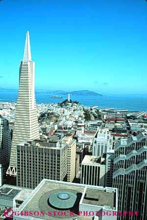 Stock Photo #10726: keywords -  and bay building buildings california cities city cityscape cityscapes coit downtown elevate elevated francisco high office overhead overview rise san shape shapes skyline skylines tower transamerica triangle triangles urban vert view