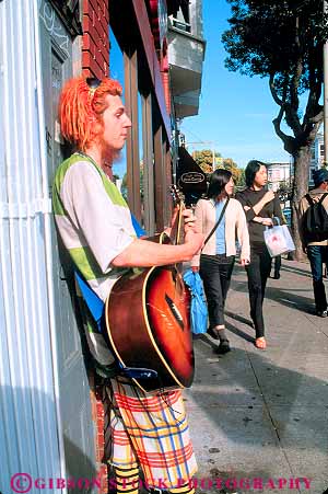 Stock Photo #11483: keywords -  alternative artist ashbury california community counter culture district francisco haight historic man men music musician neighborhood san sidewalk singer singing street vert