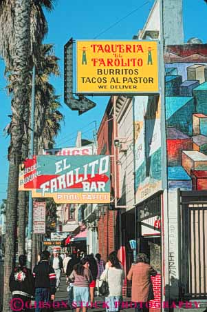 Stock Photo #10765: keywords -  bilingual business california community district ethnic francisco fronts hispanic mexican mission neighborhood neighborhoods san sign signs spanish store stores street vert