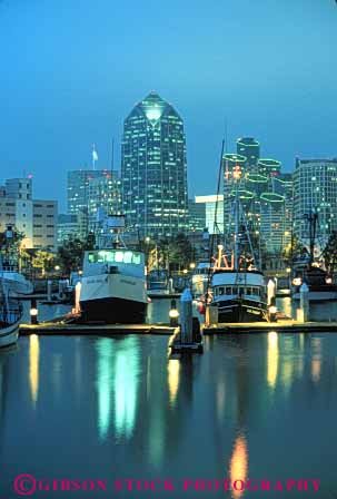 Stock Photo #7797: keywords -  america american architecture boat boats building buildings business california center cities city cityscape cityscapes dark diego downtown dusk evening fishing harbor harbors high lights marina marinas modern new night office rise san skyline skylines urban usa vert water