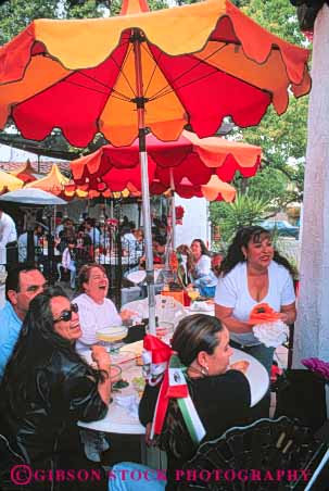 Stock Photo #9391: keywords -  cafe cafes california diego dine dining ethnic family group groups happy heritage hispanic historic in laughs mexican minority old outdoor outside park people person san site smile state town umbrella vert