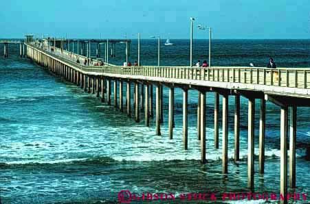 Stock Photo #9443: keywords -  beach beaches california cement coast coastal concrete diego dock docks engineer engineered engineering horz leg legs lines ocean parallel pier piers pile piling pilings platform san sea seashore shore shoreline support supported supports water