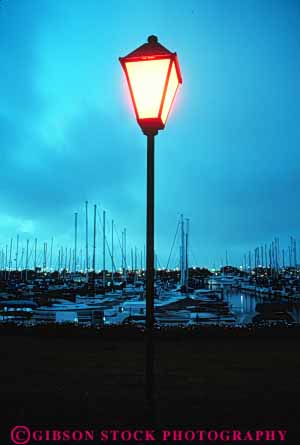 Stock Photo #9451: keywords -  bay blue boat boating boats bright california dark dawn diego evening harbor harbors lamp light lighting lights marina marinas mood moody night san summer vert water yacht yachts