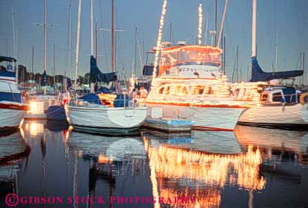 Stock Photo #9474: keywords - annual boat bright california christmas cities city dark decorated diego display dusk evening event events for holiday horz lighted lighting lights night parade parades sailboat san