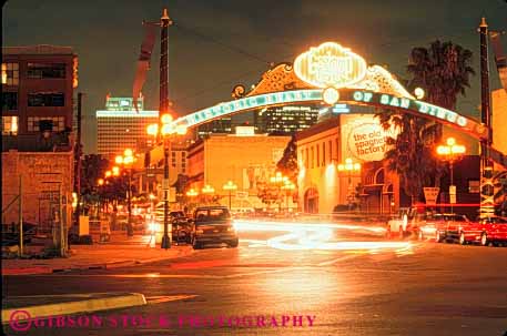 Stock Photo #9479: keywords -  arch arches area bright building buildings california cities city community diego gas heritage historic horz lamp lighted neon night old quarter san sign signs vintage