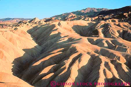 Stock Photo #12281: keywords - arid california climate climatology death desert deserts dry erode eroded eroding erosion habitat horz hot national park parks pattern point ridge ridges shadow shadows sunny texture valley valleys warm zabriskie