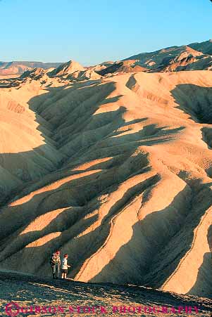 Stock Photo #12283: keywords -  arid california climate climatology death desert deserts dry dusk erode eroded eroding erosion evening habitat hot national park parks pattern people point ridge ridges shadow shadows sunny texture valley valleys vert warm zabriskie