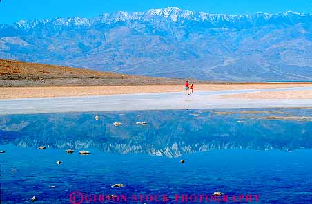 Stock Photo #12292: keywords -  arid bad below brine buildup california calm climate climatology crust crusted death depressed depression desert deserts dry elevation flat habitat horz hot lakebed level low lowest minus mountains national negative number park parks people place reflect reflecting reflection reflections reflects salt sea spot still subsidence sunny valley valleys walking warm water