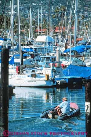 Stock Photo #9863: keywords -  barbara boat boats california coast coastal harbor harbors in marina marinas marine maritime motorboat motorboats ocean outboard saltwater santa sea seashore shore vert water wharf wharfs