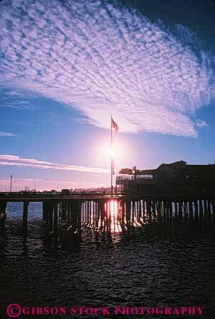 Stock Photo #9869: keywords -  barbara boat boats california coast coastal dark dusk evening harbors marina marinas marine maritime night ocean saltwater santa sea seashore shore stearns sunset sunsets vert water wharf wharfs