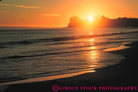 Stock Photo #9874: keywords -  barbara beach beaches california coast coastal dark dusk environment evening horz marine maritime nature ocean orange saltwater santa sea seashore shore sunset surf water