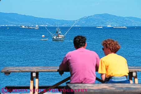 Stock Photo #9875: keywords - barbara boat boats california coast coastal couple harbors horz man marina marinas marine maritime ocean pair relaxes saltwater santa sea seashore shirt shore stearns summer tee water wharf wharfs woman