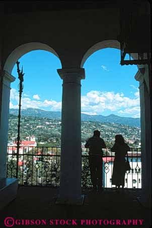 Stock Photo #9885: keywords -  arch arches architecture barbara building buildings california county couple court courthouse courthouses deck design elevate elevated government house in municipal observation overlook overview people public santa see silhouette silhouettes spanish style tower vert view