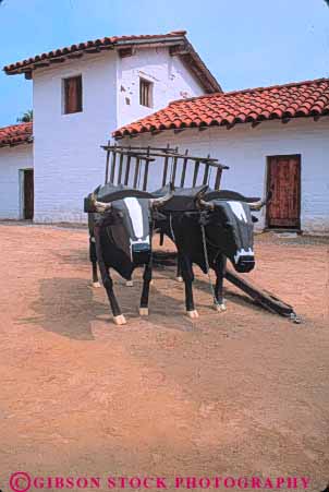 Stock Photo #9898: keywords -  adobe adobes american architecture barbara building buildings california cart carts de design el exhibit historic history ox presidio santa site sites spanish style vert