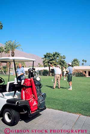 Stock Photo #12717: keywords -  california cart carts destination friend friends golf golfer golfers golfing golfs group groups leisure man men outdoor outside palm people play player players playing plays recreation relax relaxes relaxing resort resorts season sport spring springs summer travel vacation vert