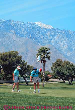 Stock Photo #12718: keywords -  california cart carts desert destination friend friends golf golfer golfers golfing golfs leisure man men outdoor outside pair palm people play player players playing plays recreation relax relaxes relaxing resort resorts season sport spring springs summer travel two vacation vert